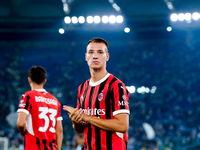 Francesco Camarda of AC Milan greets the fans during the Serie A Enilive match between SS Lazio and AC Milan at Stadio Olimpico on Aug 31, 2...