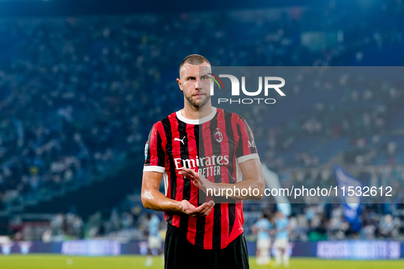 Strahinja Pavlovic of AC Milan greets the fans during the Serie A Enilive match between SS Lazio and AC Milan at Stadio Olimpico on Aug 31,...