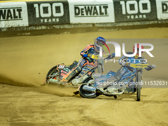 Mikkel Michelsen and Robert Lambert participate in a FIM Speedway Grand Prix in Wroclaw, Poland, on August 31, 2024. (