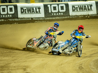 Mikkel Michelsen and Robert Lambert participate in a FIM Speedway Grand Prix in Wroclaw, Poland, on August 31, 2024. (