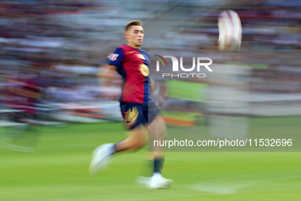 Fermin Lopez plays during the match between FC Barcelona and Real Valladolid CF, corresponding to week 4 of LaLiga EA Sports, at the Lluis C...