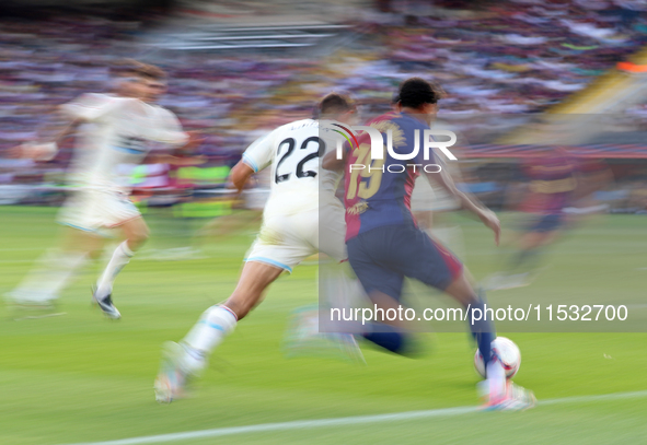 Lamine Yamal and Lucas Rosa play during the match between FC Barcelona and Real Valladolid CF, corresponding to week 4 of LaLiga EA Sports,...