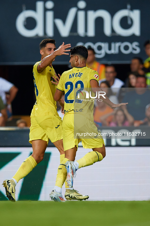 Ayoze (R) of Villarreal CF celebrates after scoring the team's first goal with his teammate Sergi Cardona of Villarreal CF during the LaLiga...