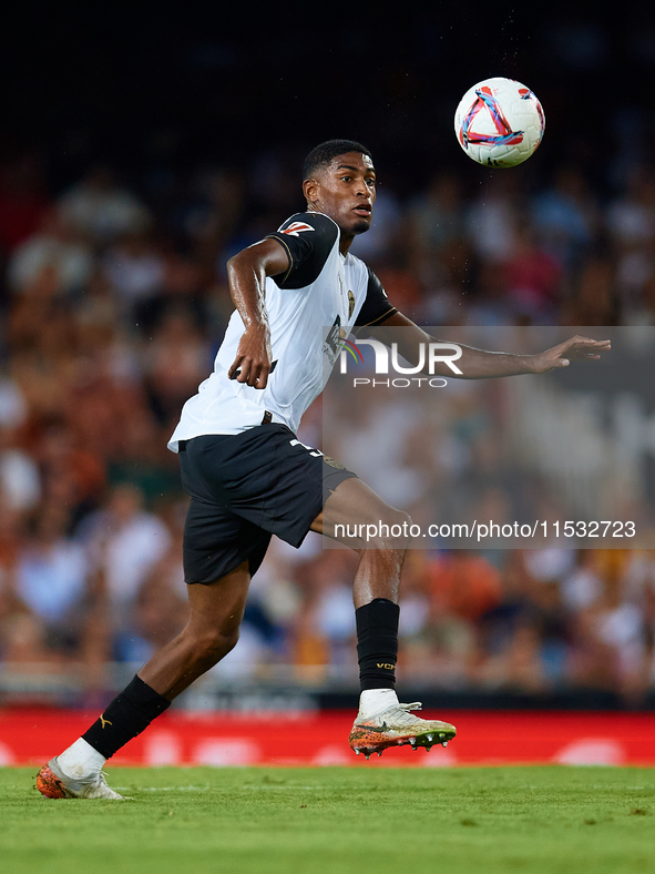 Cristhian Mosquera of Valencia CF is in action during the LaLiga EA Sports match between Valencia CF and Villarreal CF at Mestalla stadium i...