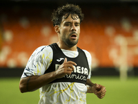 Juan Bernat of Villarreal CF and Ruben Baraja after the La Liga match between Valencia CF and Villarreal CF at Mestalla Stadium in Valencia,...