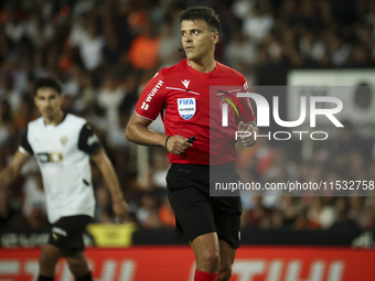 Jesus Gil Manzano referees during the La Liga match between Valencia CF and Villarreal CF at Mestalla Stadium in Valencia, Spain, on August...