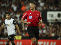 Jesus Gil Manzano referees during the La Liga match between Valencia CF and Villarreal CF at Mestalla Stadium in Valencia, Spain, on August...