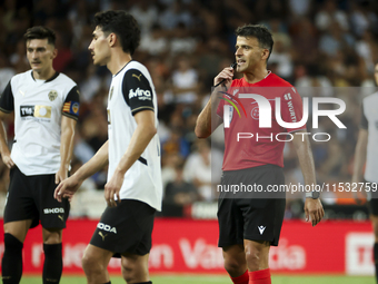 Jesus Gil Manzano referees during the La Liga match between Valencia CF and Villarreal CF at Mestalla Stadium in Valencia, Spain, on August...