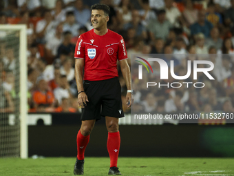 Jesus Gil Manzano referees during the La Liga match between Valencia CF and Villarreal CF at Mestalla Stadium in Valencia, Spain, on August...