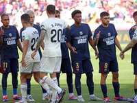 FC Barcelona players display a message of support for Marc Bernal during the match between FC Barcelona and Real Valladolid CF, correspondin...