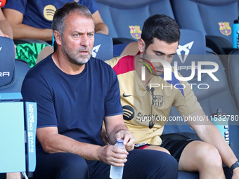 Hansi Flick coaches during the match between FC Barcelona and Real Valladolid CF, corresponding to week 4 of LaLiga EA Sports, at the Lluis...