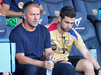 Hansi Flick coaches during the match between FC Barcelona and Real Valladolid CF, corresponding to week 4 of LaLiga EA Sports, at the Lluis...