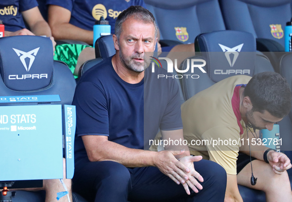 Hansi Flick coaches during the match between FC Barcelona and Real Valladolid CF, corresponding to week 4 of LaLiga EA Sports, at the Lluis...