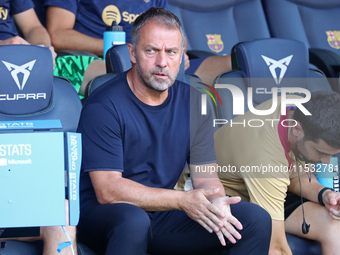 Hansi Flick coaches during the match between FC Barcelona and Real Valladolid CF, corresponding to week 4 of LaLiga EA Sports, at the Lluis...