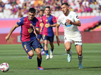 Pedri and Selim Amallah play during the match between FC Barcelona and Real Valladolid CF, corresponding to week 4 of LaLiga EA Sports, at t...