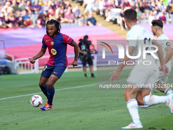 Jules Kounde plays during the match between FC Barcelona and Real Valladolid CF, corresponding to week 4 of LaLiga EA Sports, at the Lluis C...