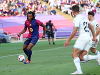 Jules Kounde plays during the match between FC Barcelona and Real Valladolid CF, corresponding to week 4 of LaLiga EA Sports, at the Lluis C...