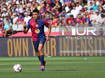 Pedri plays during the match between FC Barcelona and Real Valladolid CF, corresponding to week 4 of LaLiga EA Sports, at the Lluis Companys...