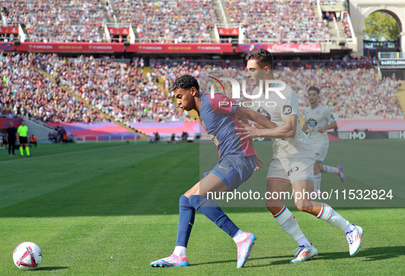 Lamine Yamal and Lucas Rosa play during the match between FC Barcelona and Real Valladolid CF, corresponding to week 4 of LaLiga EA Sports,...