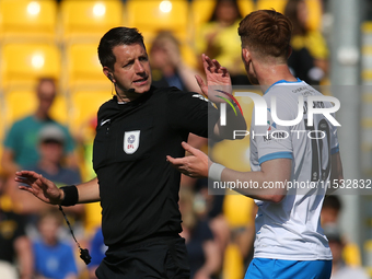 Barrow's Ged Garner appeals to Referee Scott Simpson during the Sky Bet League 2 match between Harrogate Town and Barrow at Wetherby Road in...