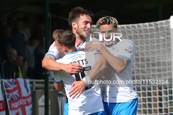 Barrow's Robbie Gotts (L), Barrow's Niall Canavan (M), and Barrow's Theo Vassell (R) celebrate a disallowed goal during the Sky Bet League 2...