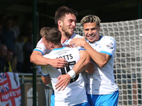 Barrow's Robbie Gotts (L), Barrow's Niall Canavan (M), and Barrow's Theo Vassell (R) celebrate a disallowed goal during the Sky Bet League 2...