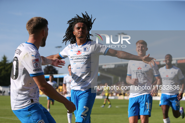 Barrow's Neo Eccleston celebrates his goal during the Sky Bet League 2 match between Harrogate Town and Barrow at Wetherby Road in Harrogate...