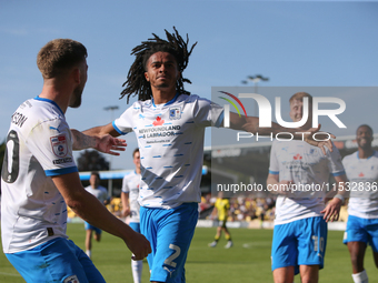 Barrow's Neo Eccleston celebrates his goal during the Sky Bet League 2 match between Harrogate Town and Barrow at Wetherby Road in Harrogate...