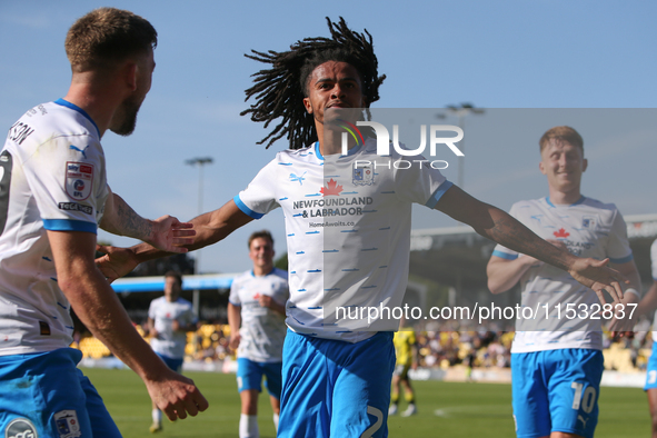 Barrow's Neo Eccleston celebrates his goal during the Sky Bet League 2 match between Harrogate Town and Barrow at Wetherby Road in Harrogate...