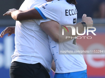 Barrow Manager Stephen Clemence celebrates with Barrow's Neo Eccleston during the Sky Bet League 2 match between Harrogate Town and Barrow a...