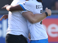 Barrow Manager Stephen Clemence celebrates with Barrow's Neo Eccleston during the Sky Bet League 2 match between Harrogate Town and Barrow a...