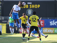 Barrow's Neo Eccleston wins a header during the Sky Bet League 2 match between Harrogate Town and Barrow at Wetherby Road in Harrogate, Engl...