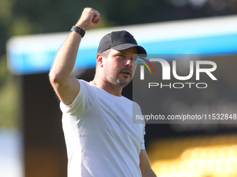 Barrow Manager Stephen Clemence celebrates at full time during the Sky Bet League 2 match between Harrogate Town and Barrow at Wetherby Road...