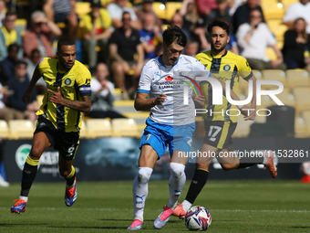 Barrow's Chris Popov runs with the ball during the Sky Bet League 2 match between Harrogate Town and Barrow at Wetherby Road in Harrogate, E...