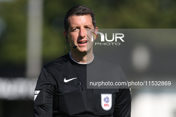 Referee Scott Simpson officiates the Sky Bet League 2 match between Harrogate Town and Barrow at Wetherby Road in Harrogate, England, on Aug...