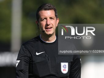 Referee Scott Simpson officiates the Sky Bet League 2 match between Harrogate Town and Barrow at Wetherby Road in Harrogate, England, on Aug...