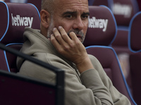 Pep Guardiola of Manchester City during the Premier League match between West Ham United and Manchester City at the London Stadium in Stratf...