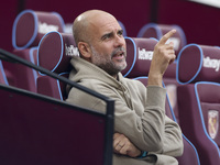 Pep Guardiola of Manchester City during the Premier League match between West Ham United and Manchester City at the London Stadium in Stratf...