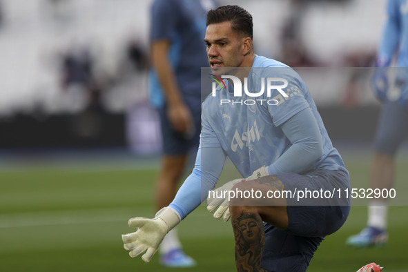 Ederson of Manchester City warms up during the Premier League match between West Ham United and Manchester City at the London Stadium in Str...