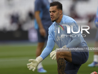 Ederson of Manchester City warms up during the Premier League match between West Ham United and Manchester City at the London Stadium in Str...