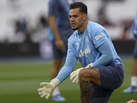 Ederson of Manchester City warms up during the Premier League match between West Ham United and Manchester City at the London Stadium in Str...