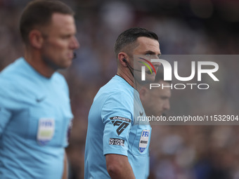 Match referee Michael Oliver during the Premier League match between West Ham United and Manchester City at the London Stadium in Stratford,...