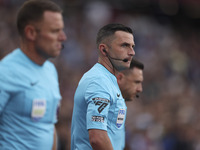 Match referee Michael Oliver during the Premier League match between West Ham United and Manchester City at the London Stadium in Stratford,...