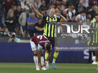 Erling Haaland of Manchester City celebrates his second goal during the Premier League match between West Ham United and Manchester City at...