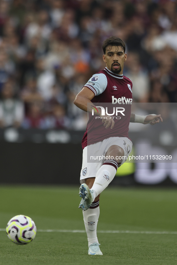 Lucas Paqueta of West Ham United passes the ball during the Premier League match between West Ham United and Manchester City at the London S...