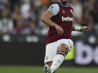 Lucas Paqueta of West Ham United passes the ball during the Premier League match between West Ham United and Manchester City at the London S...