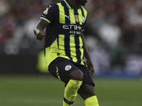 Jeremy Doku of Manchester City on the ball during the Premier League match between West Ham United and Manchester City at the London Stadium...