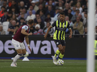 Matheus Nunes of Manchester City on the ball during the Premier League match between West Ham United and Manchester City at the London Stadi...