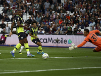 Mohammed Kudus of West Ham United shoots at goal during the Premier League match between West Ham United and Manchester City at the London S...