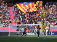 FC Barcelona supporters wave the Catalan independence flag during the match between FC Barcelona and Real Valladolid CF, corresponding to we...